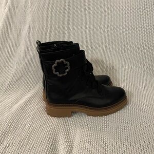 Stylish Black Combat Boots with Brown Sole